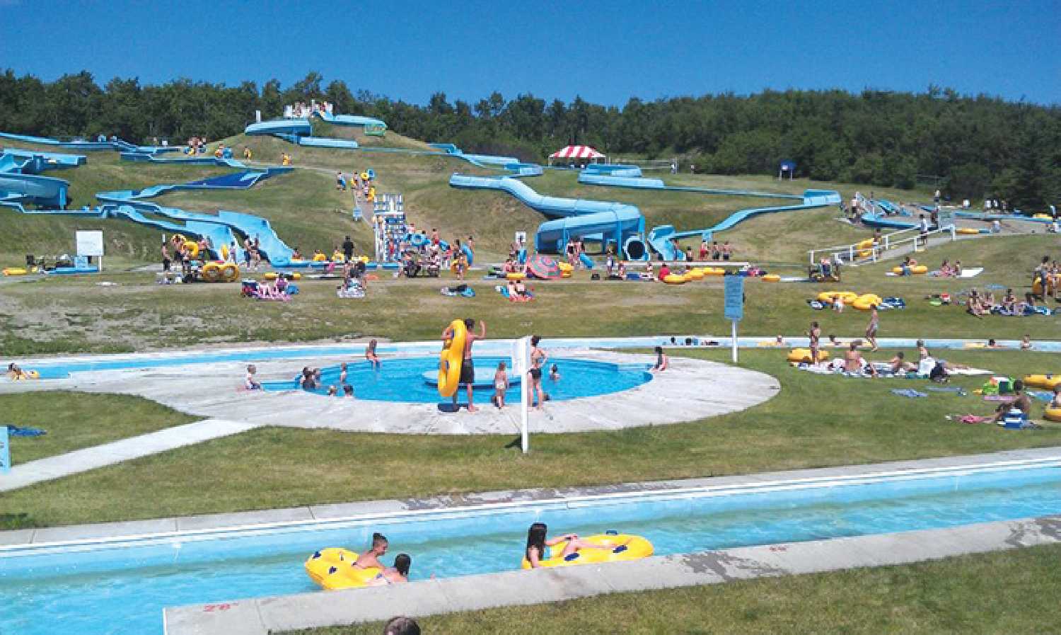 The Kenosee Superslides, once a popular place to spend sunny summer days, is being demolished.